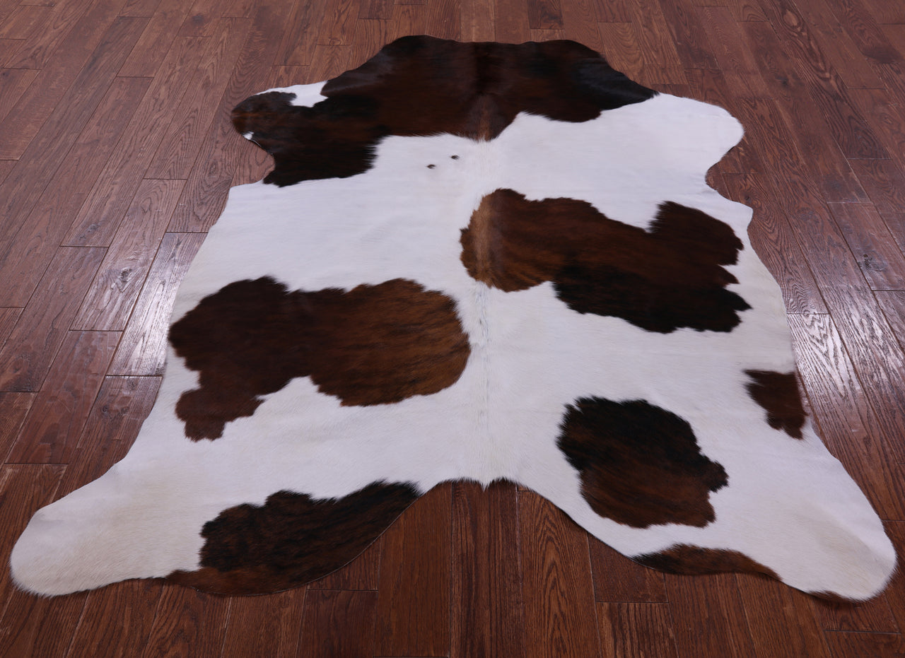 Brown & White Natural Cowhide Rug - Large 6'9"H x 5'3"W