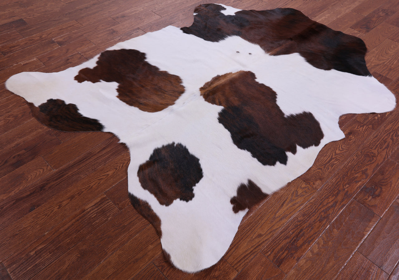 Brown & White Natural Cowhide Rug - Large 6'9"H x 5'3"W