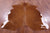 Brown & White Natural Cowhide Rug - Medium 6'3"H x 5'3"W