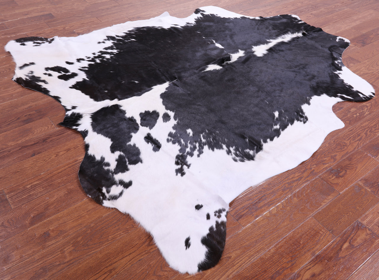 Black & White Natural Cowhide Rug - XLarge 7'7"H x 7'1"W