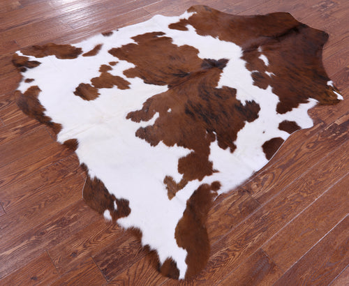 Brown & White Natural Cowhide Rug - Large 6'11