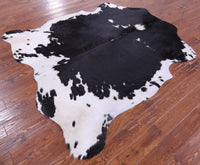 Thumbnail for Black & White Natural Cowhide Rug - X-Large 7'0