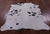 Black & White Natural Cowhide Rug - Small 5' 7"H x 5' 4"W