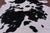 Black & White Natural Cowhide Rug - X-Large 7' 5"H x 6' 7"W