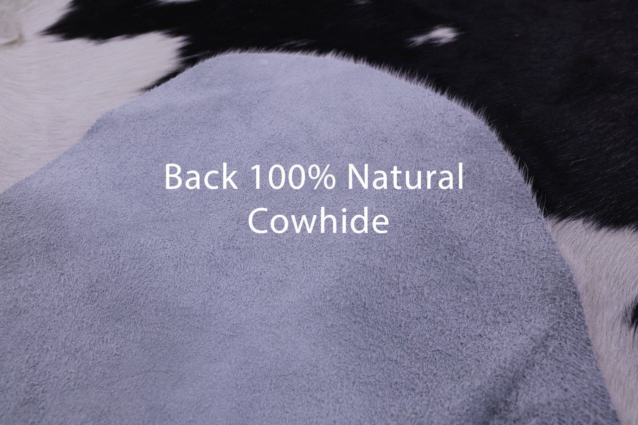 Black & White Natural Cowhide Rug - X-Large 7' 5"H x 6' 7"W
