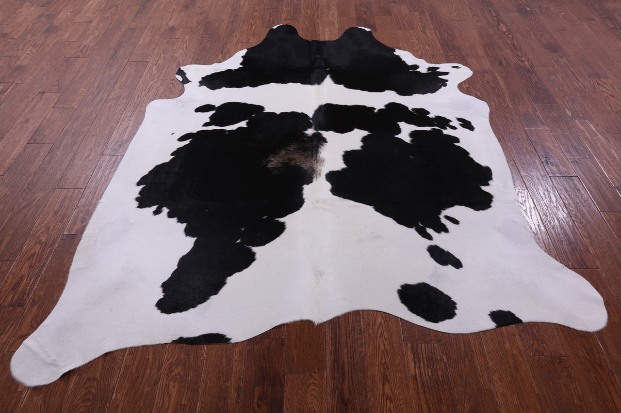 Black & White Natural Cowhide Rug - X-Large 7' 7"H x 6' 5"W