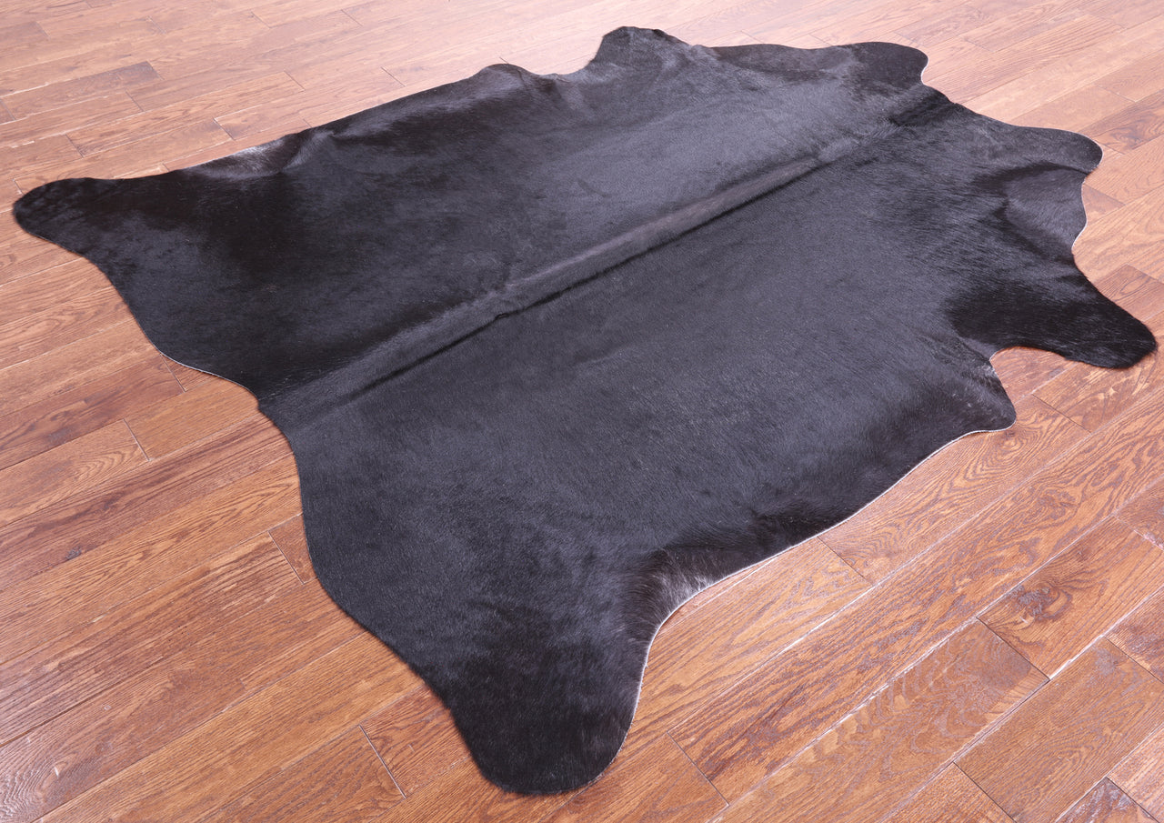 Black Natural Cowhide Rug - X-Large 7' 2"H x 6' 0"W