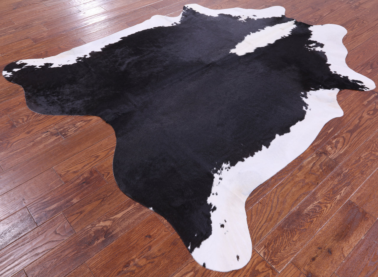 Black & White Natural Cowhide Rug - X-Large 7' 5"H x 6' 3"W