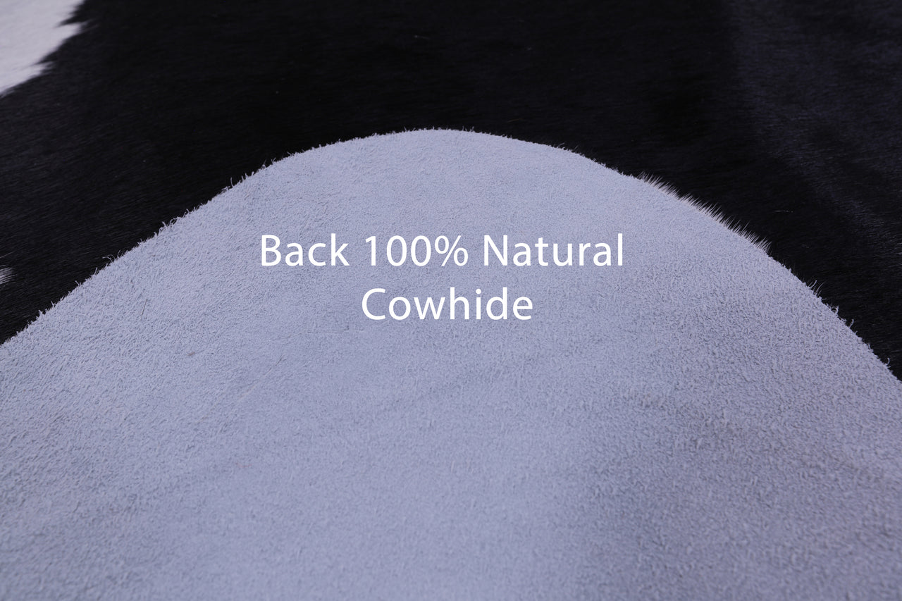 Black & White Natural Cowhide Rug - X-Large 7' 5"H x 6' 3"W