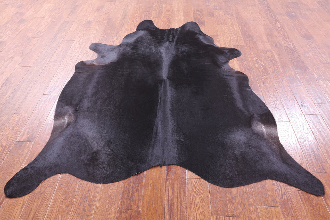 Black Natural Cowhide Rug - X-Large 7' 2"H x 6' 0"W