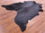 Black Natural Cowhide Rug - X-Large 7' 1"H x 6' 5"W