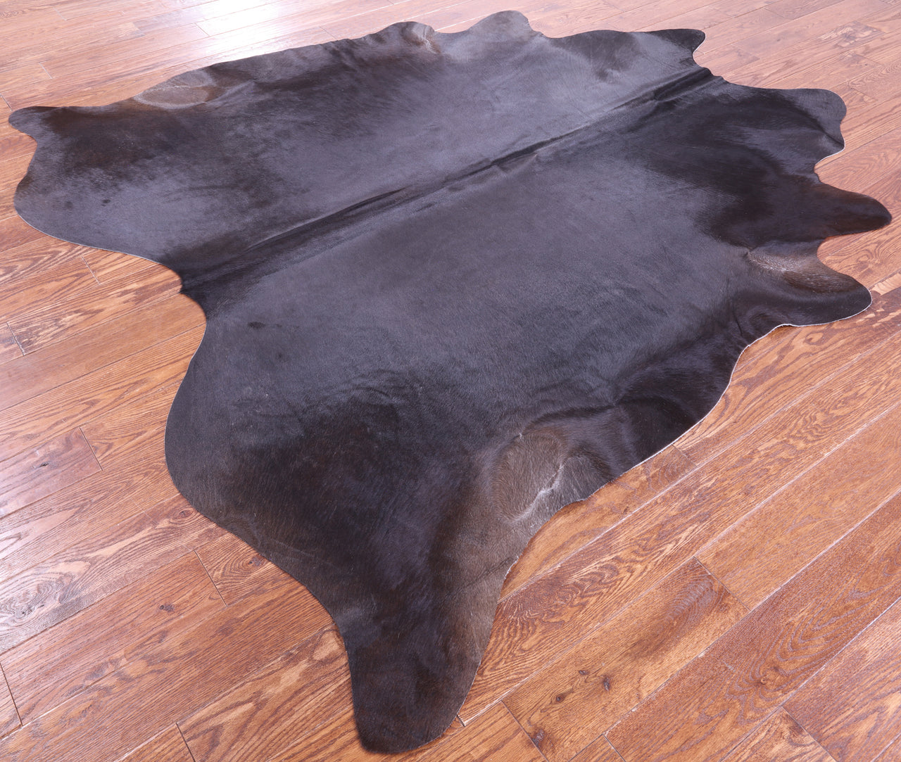Black Natural Cowhide Rug - X-Large 7' 4"H x 7' 0"W