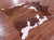 Brown & White Natural Cowhide Rug - X-Large 7' 0"H x 6' 0"W
