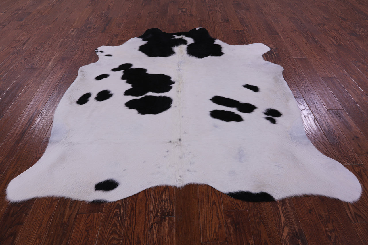 Black & White Natural Cowhide Rug - X-Large 7' 1"H x 6' 7"W