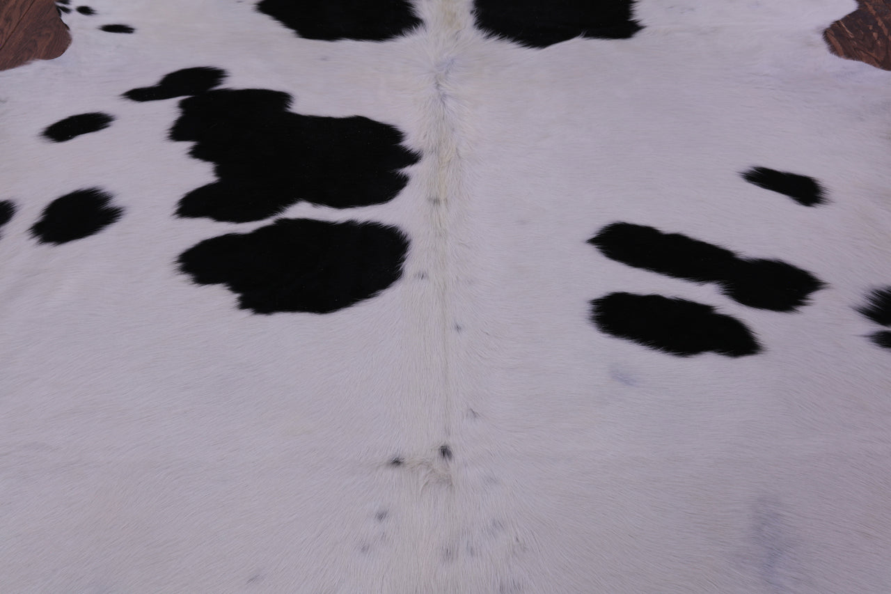 Black & White Natural Cowhide Rug - X-Large 7' 1"H x 6' 7"W