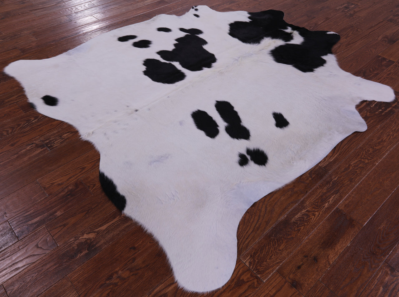 Black & White Natural Cowhide Rug - X-Large 7' 1"H x 6' 7"W