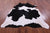 Black & White Natural Cowhide Rug - X-Large 7' 3"H x 6' 4"W