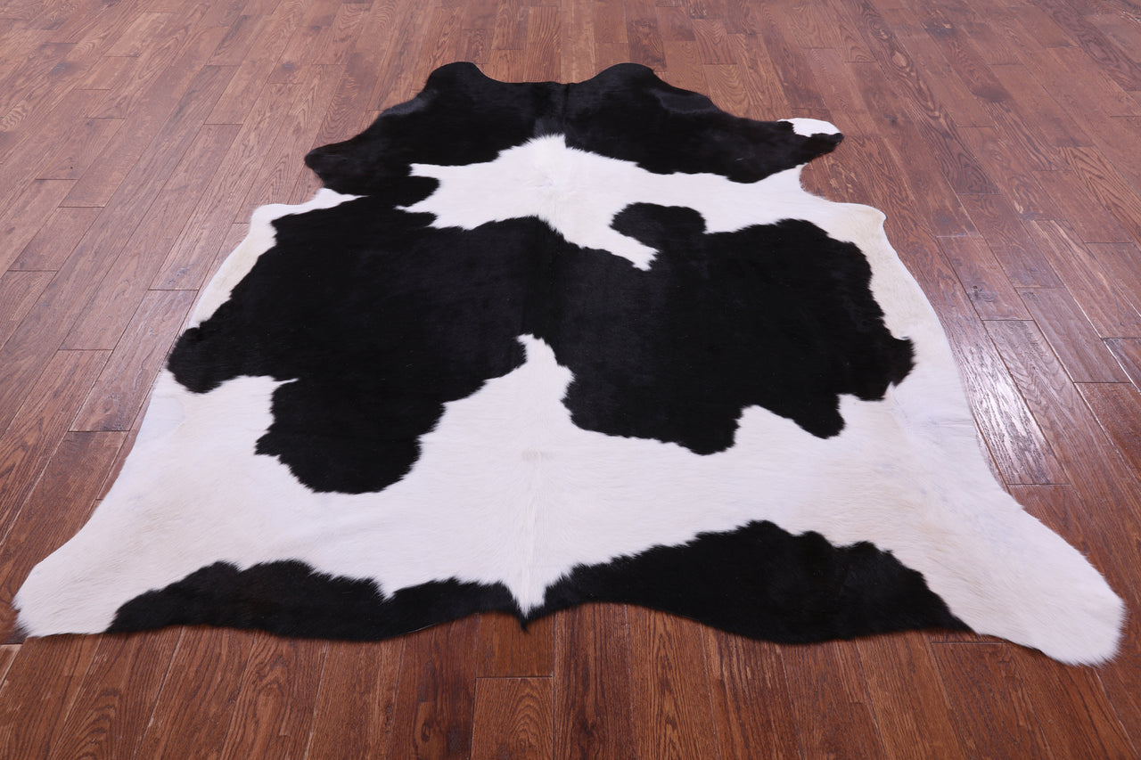 Black & White Natural Cowhide Rug - X-Large 7' 3"H x 6' 4"W