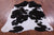 Brown & White Natural Cowhide Rug - X-Large 7' 0"H x 5' 4"W