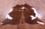Brown & White Natural Cowhide Rug - X-Large 7' 0"H x 6' 5"W