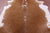 Brown & White Natural Cowhide Rug - XX-Large 7' 4"H x 6' 7"W