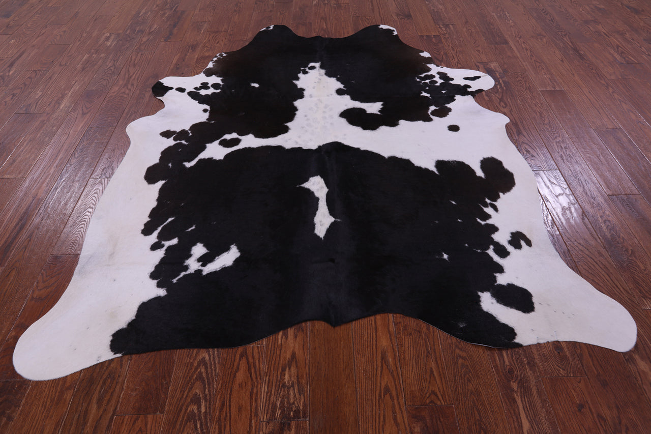 Black & White Natural Cowhide Rug - X-Large 7' 3"H x 6' 0"W