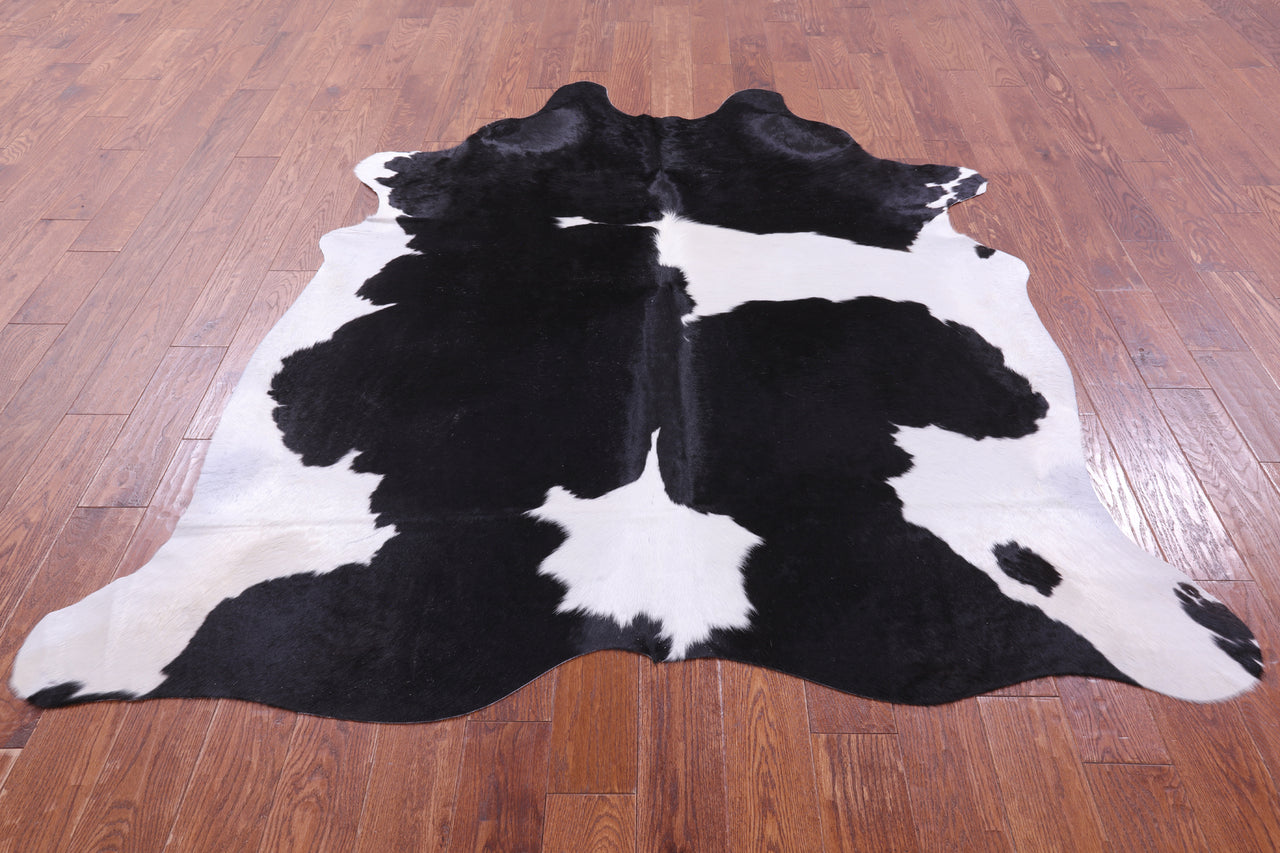 Black & White Natural Cowhide Rug - X-Large 7' 2"H x 6' 4"W