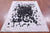 Black & White Patchwork Natural Cowhide Rug - 5' 0" x 6' 7"