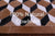 Brown & White Square Patchwork Black Natural Cowhide Rug - 5' 0" x 5' 0"