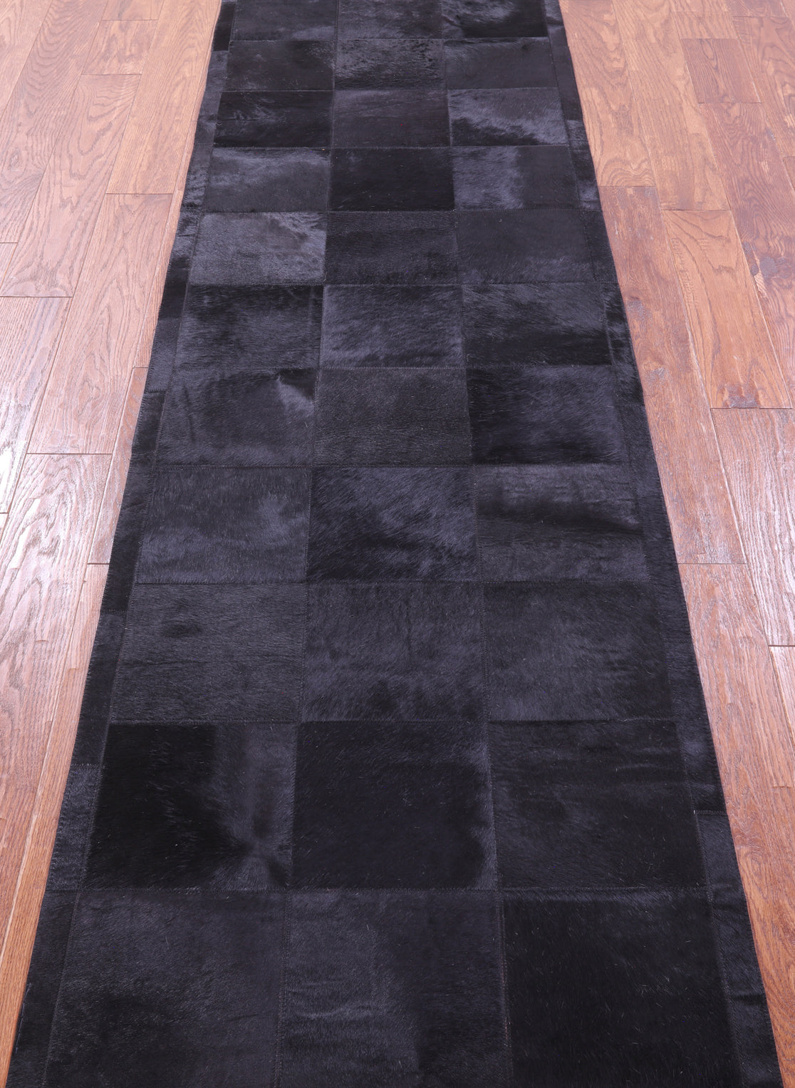 Black Patchwork Natural Cowhide Rug - 2' 6" x 12' 0"
