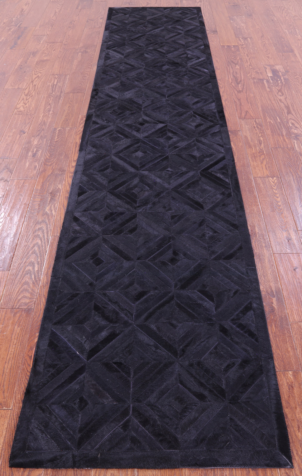 Black Patchwork Natural Cowhide Rug - 2' 6" x 12' 0"