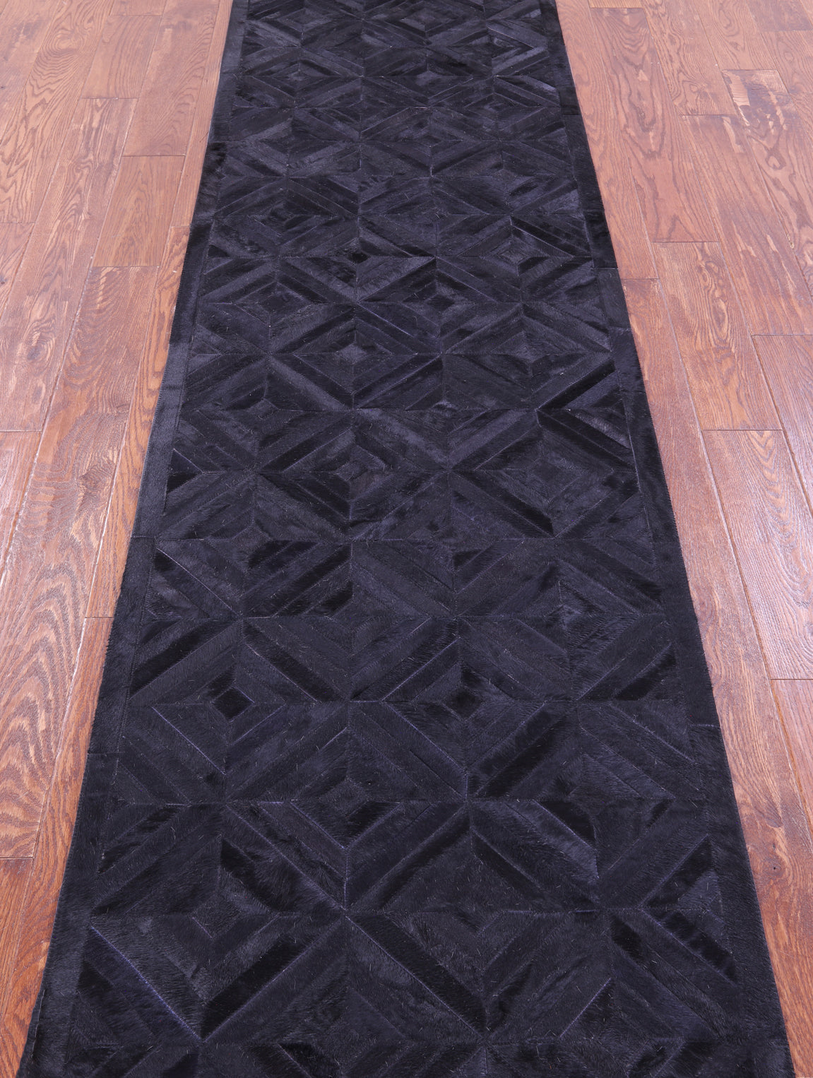 Black Patchwork Natural Cowhide Rug - 2' 6" x 12' 0"