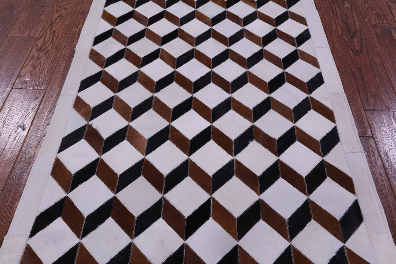 Brown & White Patchwork Black Natural Cowhide Rug - 3' 5" x 5' 0"