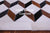 Brown & White Patchwork Black Natural Cowhide Rug - 3' 5" x 5' 0"