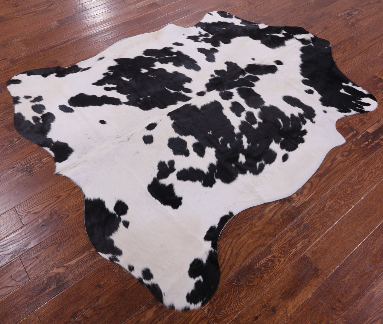 Black & White Natural Cowhide Rug - Large 7'3"H x 6'4"W