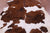 Brown & White Natural Cowhide Rug - Large 6'9"H x 5'7"W