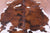 Brown & White Natural Cowhide Rug - Large 6'6"H x 5'7"W