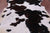 Brown & White Natural Cowhide Rug - Large 6'11"H x 6'5"W