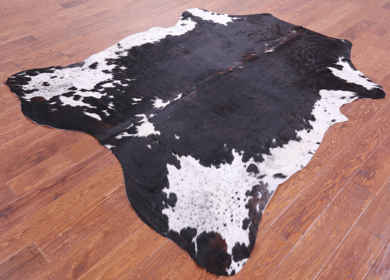 Black & White Natural Cowhide Rug - Large 7'2"H x 6'3"W