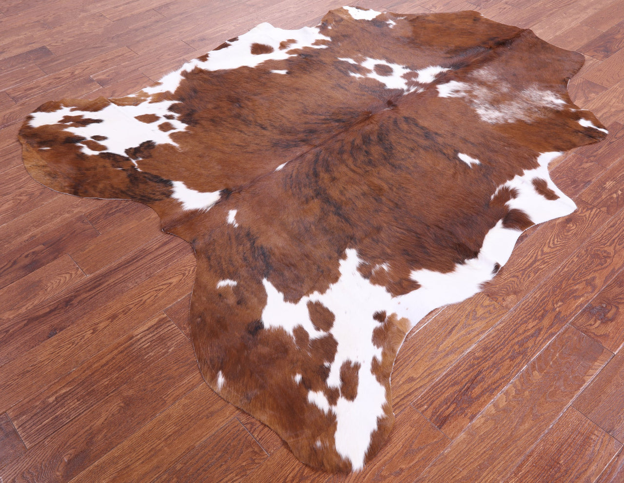 Brown & White Natural Cowhide Rug - Large 7'1"H x 6'2"W