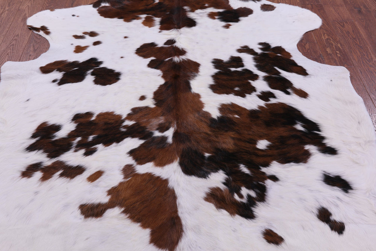 Brown & White Natural Cowhide Rug - Medium 6'10"H x 6'7"W