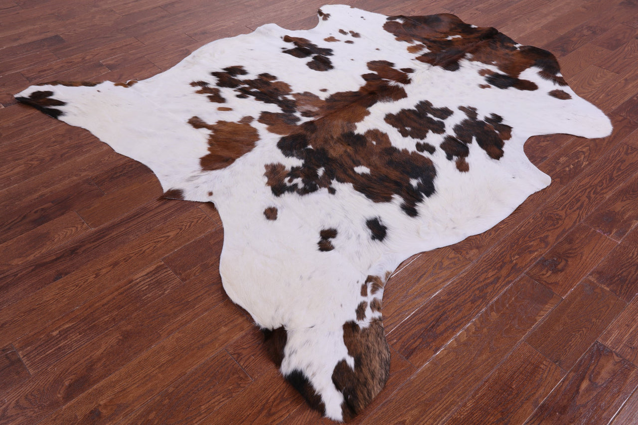 Brown & White Natural Cowhide Rug - Medium 6'10"H x 6'7"W