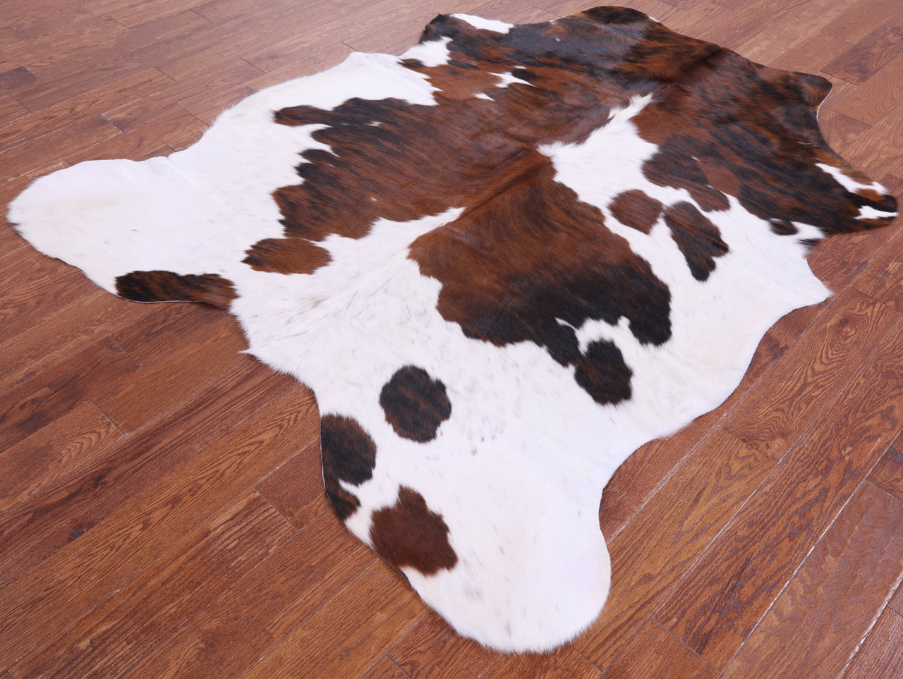 Brown & White Natural Cowhide Rug - Medium 6'8"H x 5'7"W