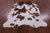 Brown & White Natural Cowhide Rug - Medium 6'6"H x 5'3"W