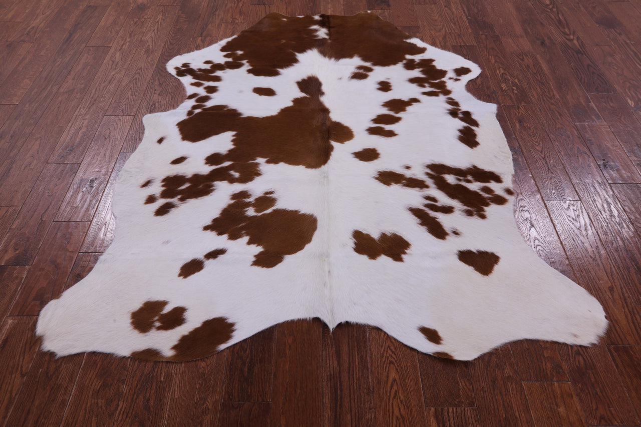 Brown & White Natural Cowhide Rug - Medium 6'6"H x 5'3"W
