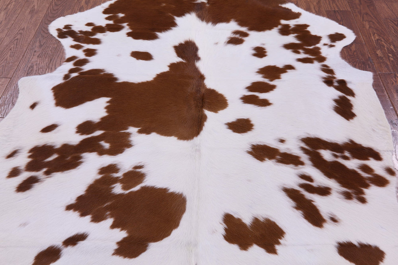 Brown & White Natural Cowhide Rug - Medium 6'6"H x 5'3"W