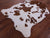 Brown & White Natural Cowhide Rug - Medium 6'6"H x 5'3"W