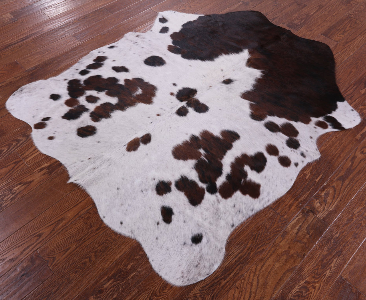 Brown & White Natural Cowhide Rug - Small 5'9"H x 4'8"W