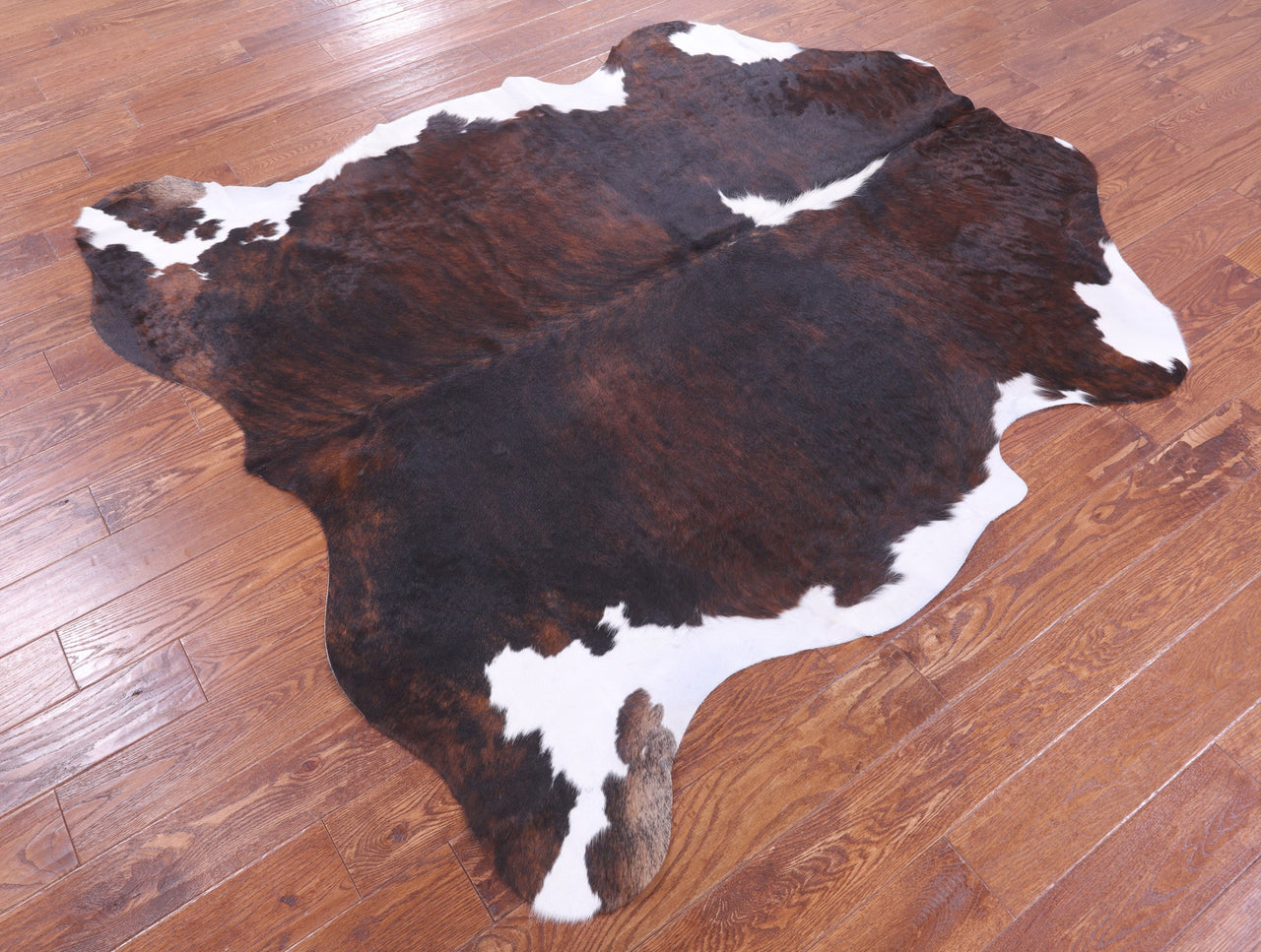 Brown & White Natural Cowhide Rug - Large 6'9"H x 6'3"W