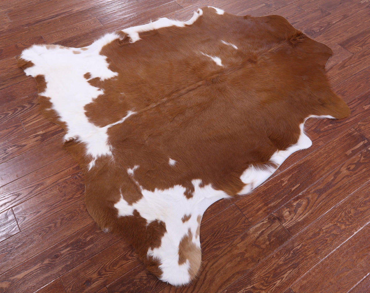 Brown & White Natural Cowhide Rug - Small 5'7"H x 5'8"W